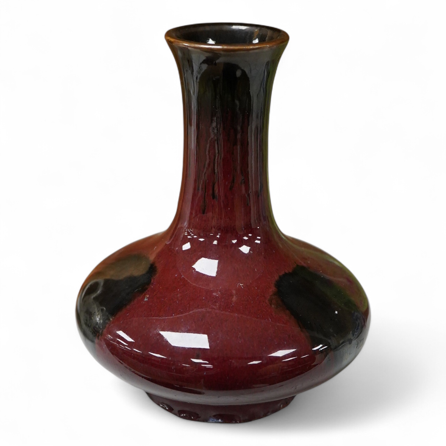 A Chinese Sang de boeuf vase, 17cm high